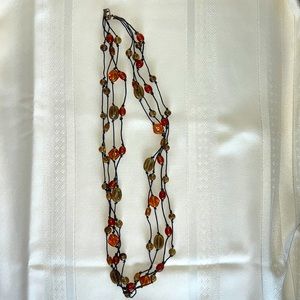 Necklace two tone, gray and golden-orange tone.